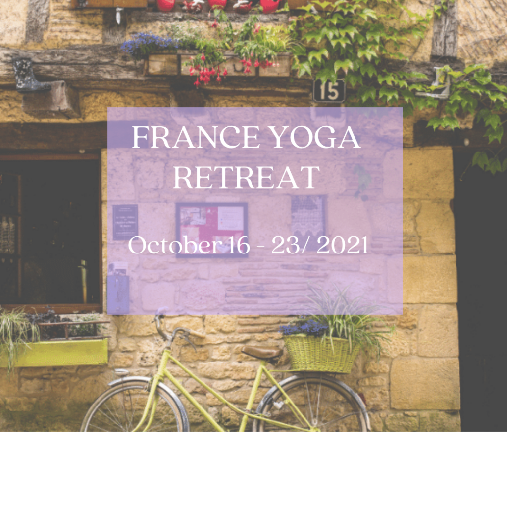 Picture of a rustic building with a bike in front of it. Image shows the text "France Yoga Retreat October 16-23"