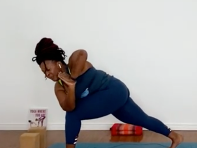 Dianne demonstrates revolved lunge with a prayer twist.